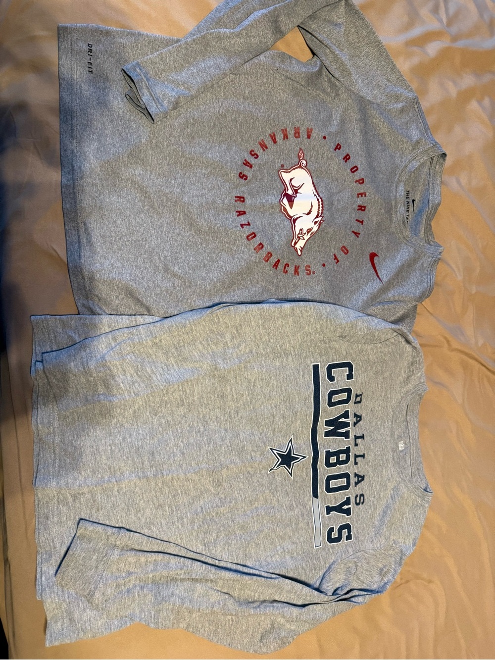 Long-Sleeve Youth Teeโs with Red Razorbacks Logo and Cowboys logo.